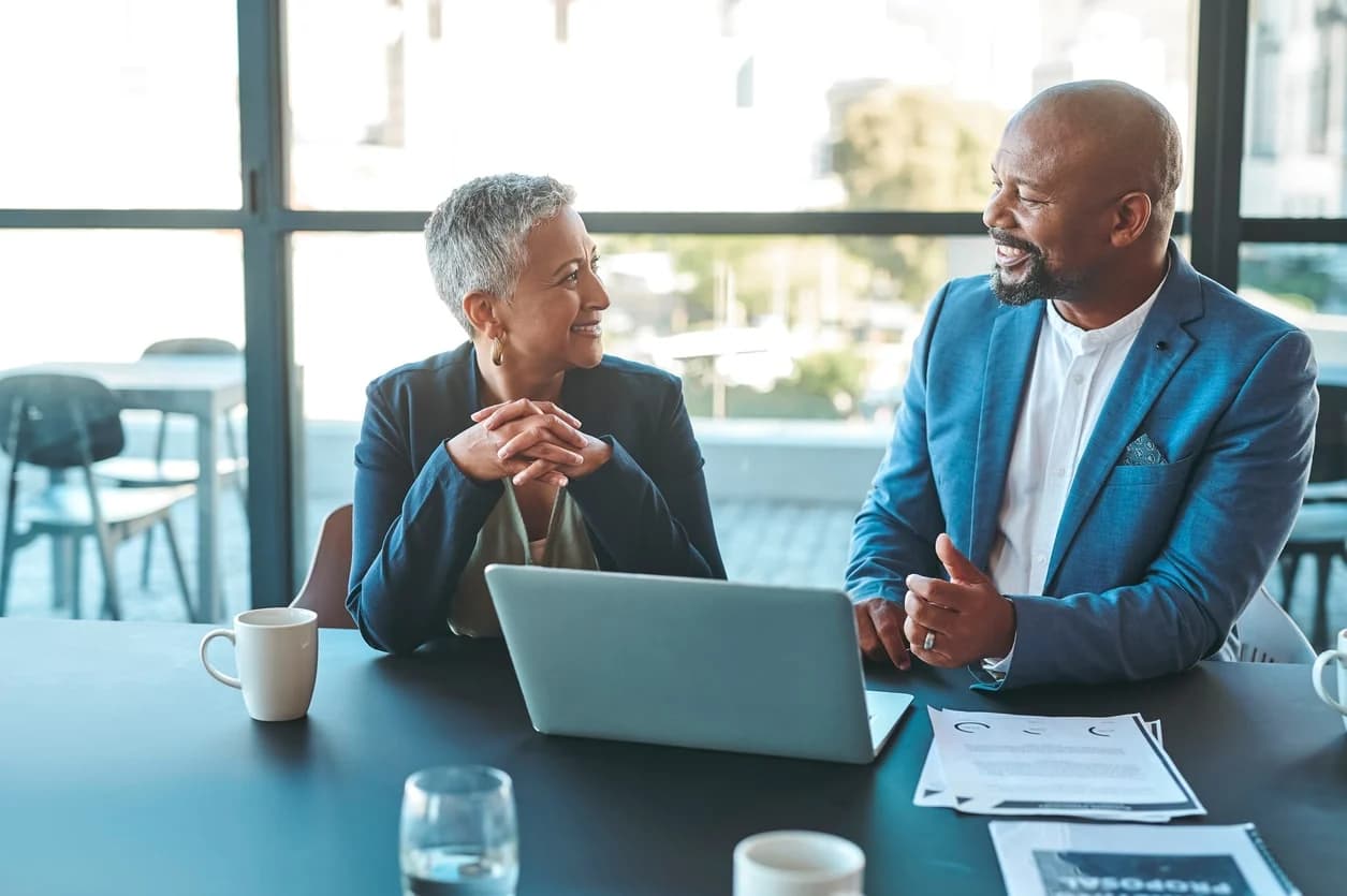 A chief legal officer meets with a stakeholder in another business unit about findings from the legal department’s contract data models.